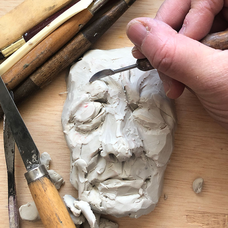 3d clay face relief